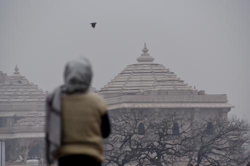 A man is watching the Ram temple ahead of its opening in Ayodhya, Uttar Pradesh, India, on January 19, 2024.